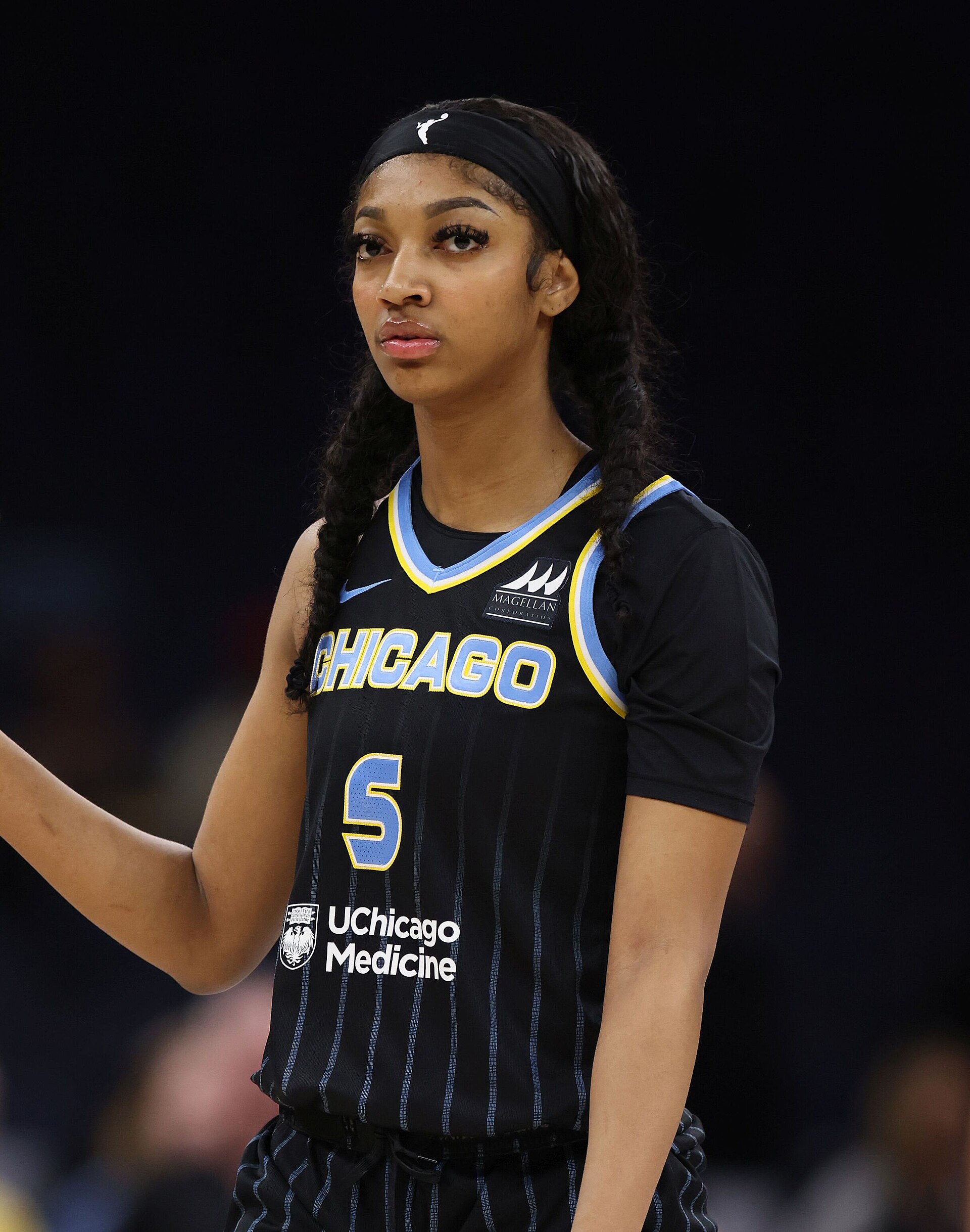 Angel Reese in Chicago Sky colors — the era that ended in April.