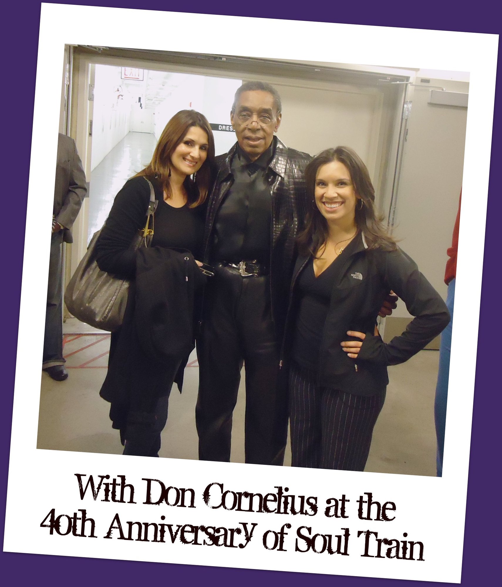 Don Cornelius with two fans at the 40th anniversary of Soul Train