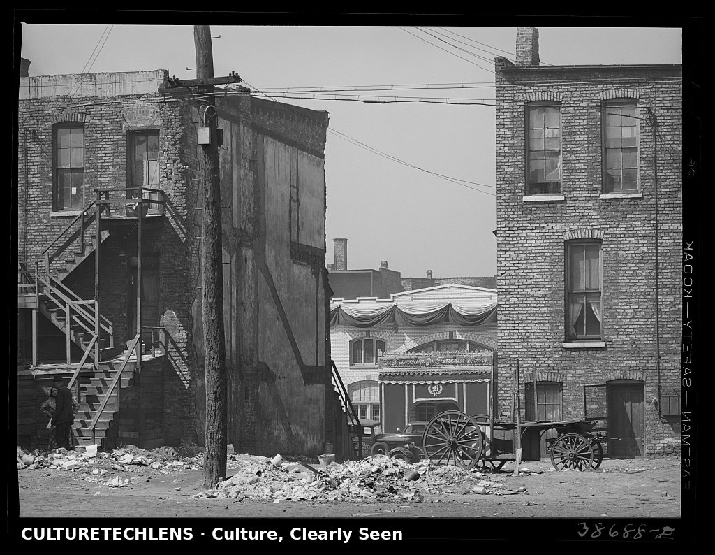 Apartment houses and funeral parlor in Negro section of Chicago, Illinois, 1941 — CultureT