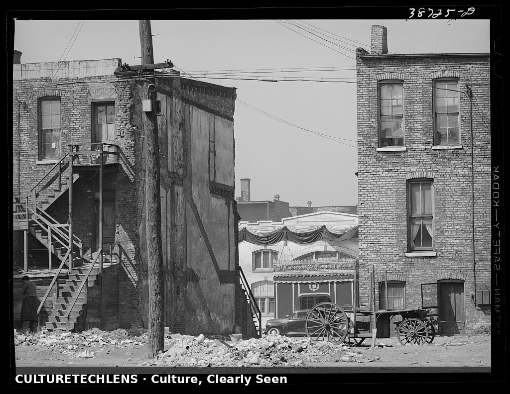 Apartment houses and funeral parlor in Negro section of Chicago, Illinois, 1941 — CultureT