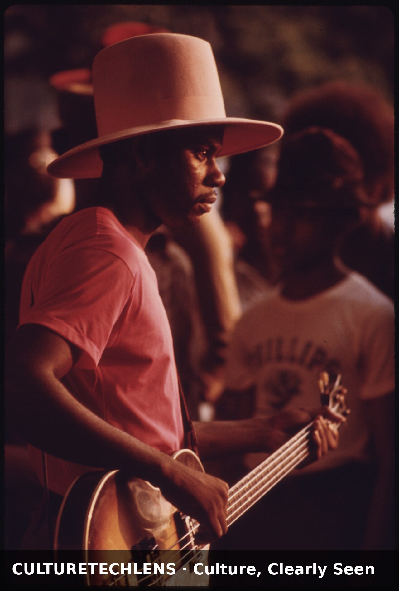 A black guitarist performs at the lake meado, Chicago — CultureTechLens