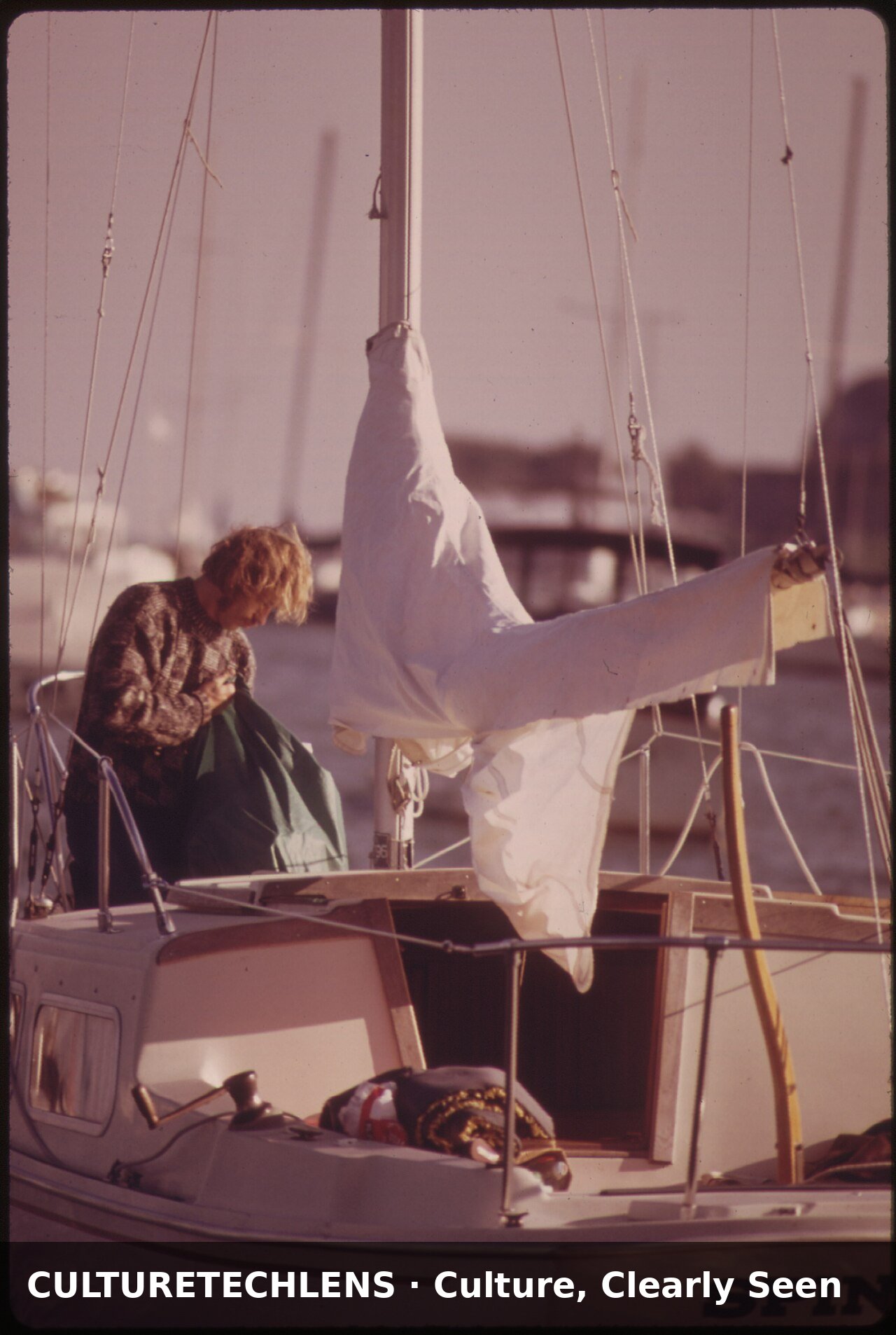Closeup of a sailboat owner readying his cra, 1973