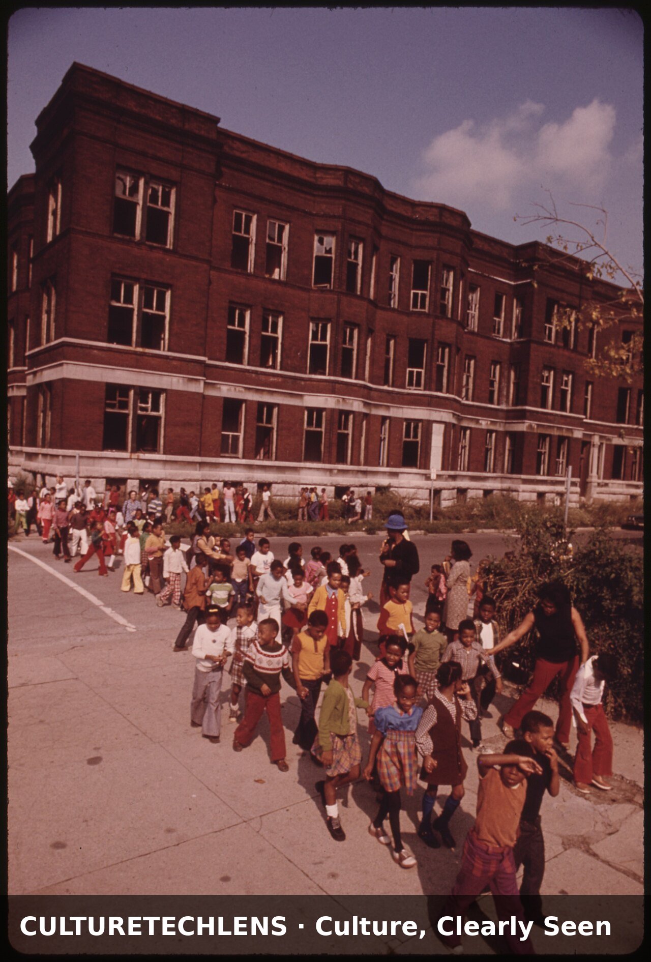 Youngsters returning to class following a fi, 1973