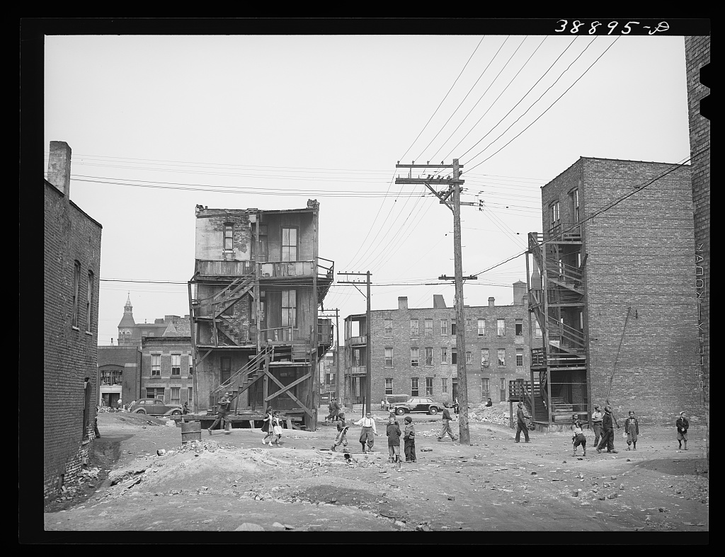 Children playing in vacant lot in Negro section of Chicago, Illinois, Chicago, 1941