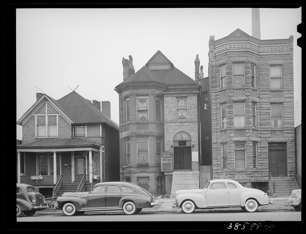 A converted-storefront church with cars of the congregation, Chicago, 1941