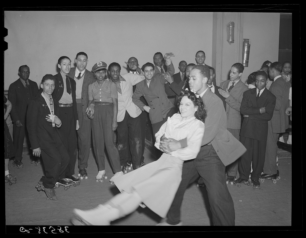 Negro swinging his girl on roller skates. Savoy Ballroom, Chicago, Illinois, Chicago